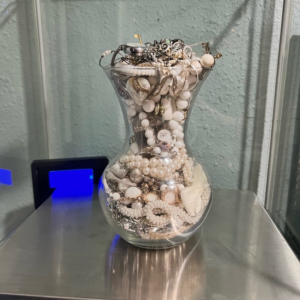 Vase of Assorted Wearable Jewelry